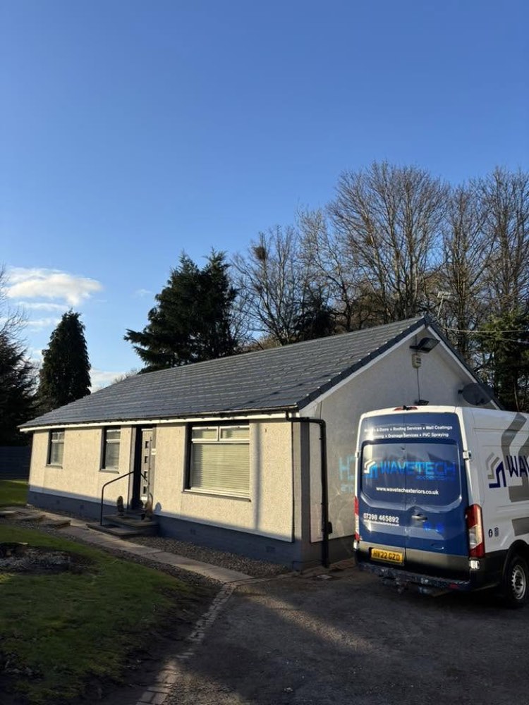 New anthracite-grey uPVC windows fitted to a freshly finished Scottish home